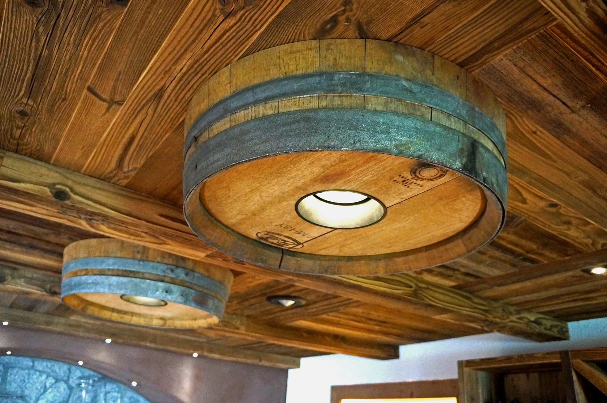 Custom-made wine barrels with recessed spotlights